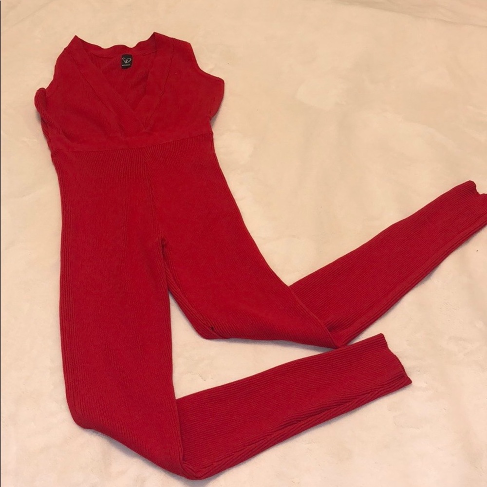 Bright red jumpsuit.